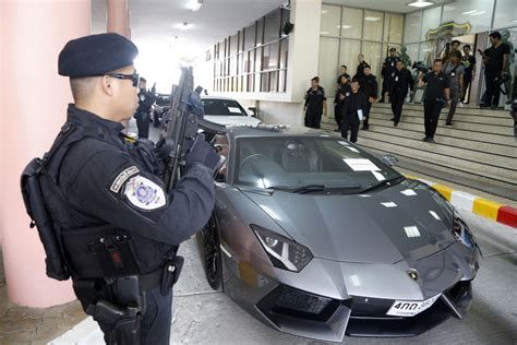 Alexandre Cazes Seized Lamborgini in front of Thai Authorities