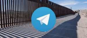 Telegram logo infront of a wall